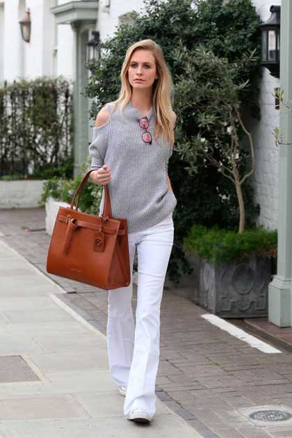 poppy-delevingne-carrying-kurt-geiger-london-victoria-belted-tote.-photo-courtesy-of-kurt-geiger,-neil-mockford-getty-images-gallery__large